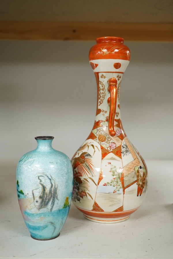 A Japanese kutani vase, 24.5cm high, and a ginbari cloisonné enamel vase decorated with goldfish, 12cm high. Condition - fair.